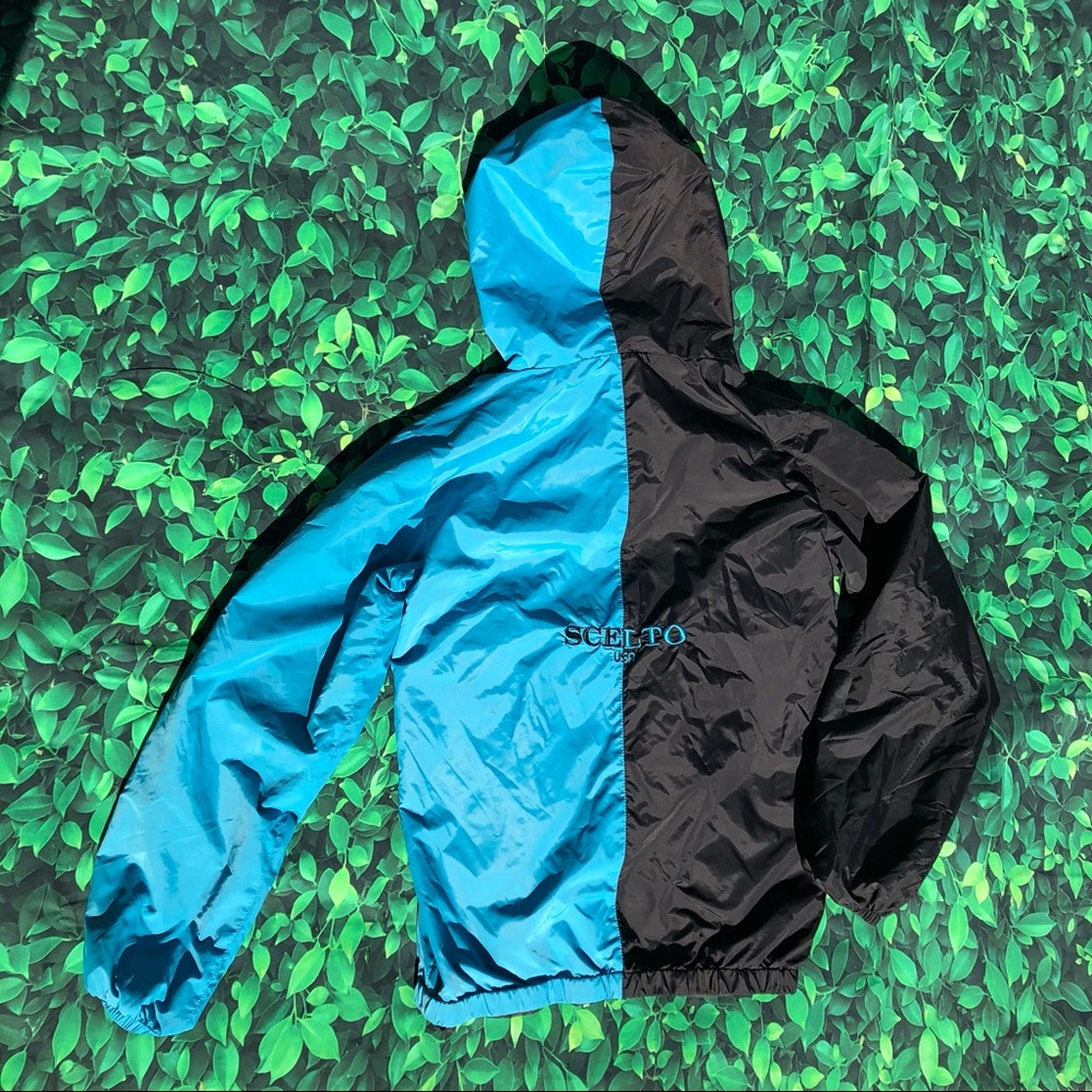 Blue and black windbreaker pouch pocket